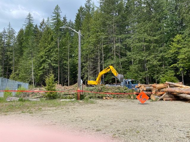 Preparing the area for the new Pickle Ball Court!